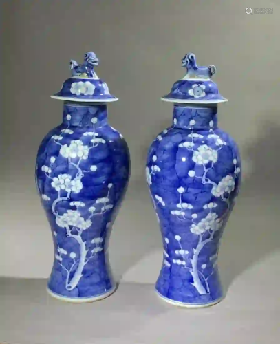PAIR OF BLUE & WHITE 'PLUM BLOSSOM' VASES WITH LIDS
