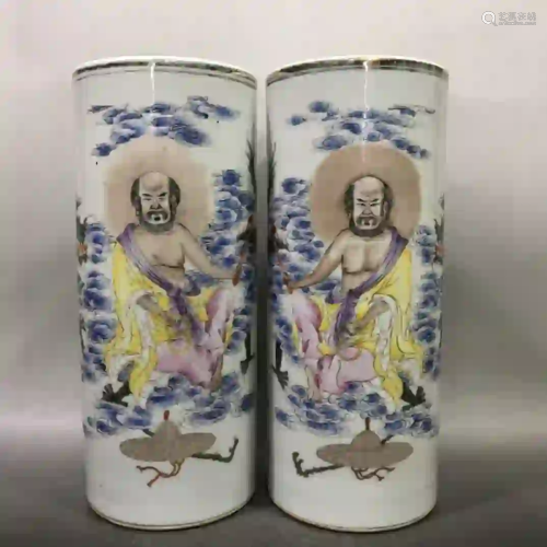 A PAIR OF FAMILLE ROSE 'ARHATS' HAT STANDS