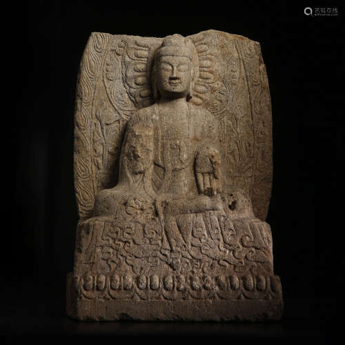 A White Rock Carved Buddha Statue