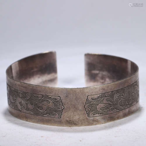 A Carved Silver Bracelet