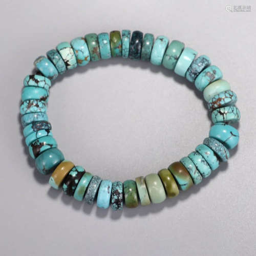 A String of Turquoise Flat Beads