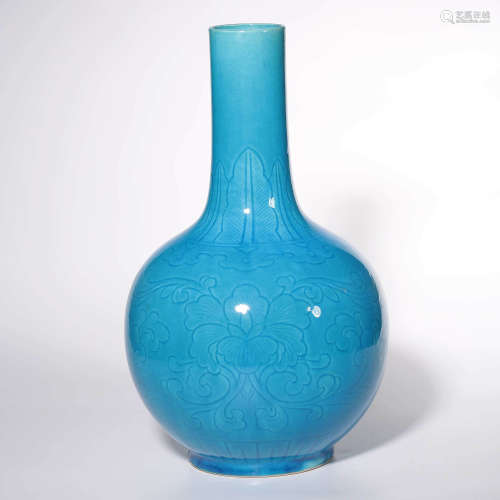 A Peacock Blue Glazed Flower Carved Porcelain Tianqiuping