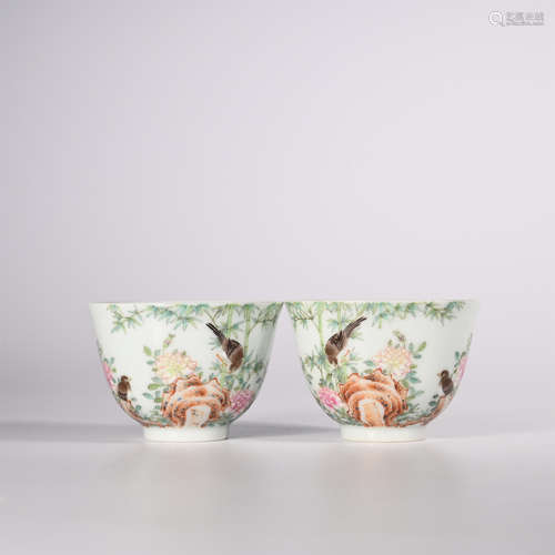 Qing A pair of famille rose cups with flowers and birds