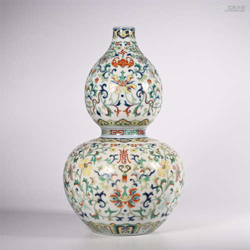 Qing Dynasty Qianlong famille rose gourd vase