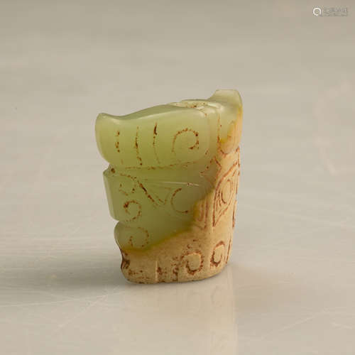 ARCHAIC JADE CARVED 'BULL HEAD' ORNAMENT