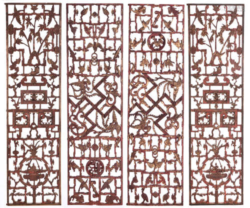 FOUR OPENWORK CARVED WOODEN HANGING PANELS