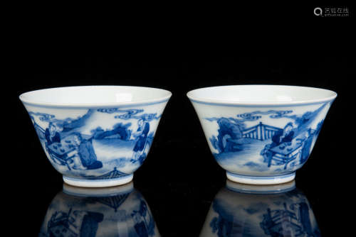 PAIR OF BLUE AND WHITE ’FIGURAL‘ CUPS