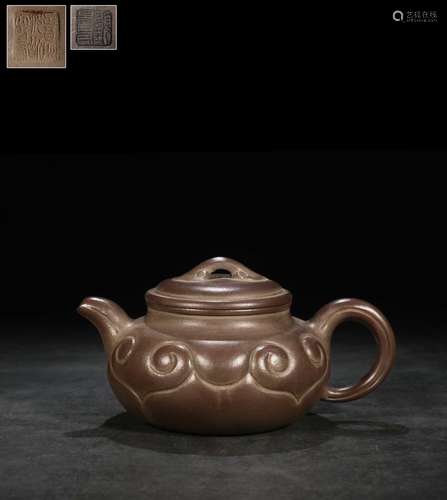 YIXING ZISHA CARVED 'RUYI' COMPRESSED TEAPOT