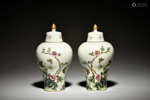 PAIR OF FAMILLE ROSE 'FLOWERS AND BUTTERFLIES' VASES WITH COVER