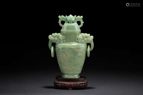 A CARVED JADE 'MYTHICAL BEAST' BOTTLE VASE