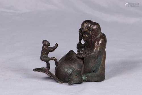 BRONZE CAST 'ELDER AND MONKEY' FIGURAL GROUP