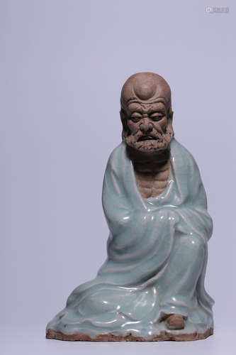 LONGQUAN WARE CARVED AND GLAZED 'ARHAT' SEATED FIGURE