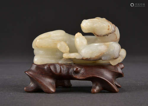 A WHITE JADE CARVING OF TWO HORSES