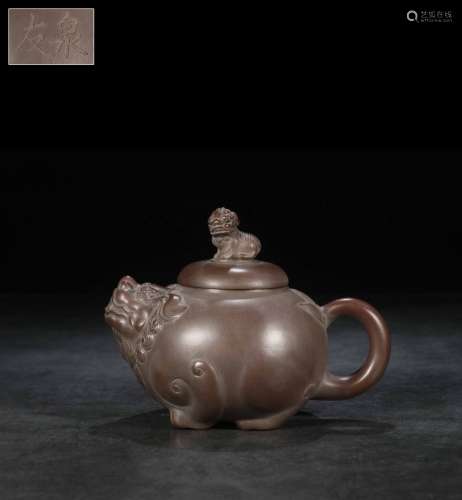 A Zisha Teapot With Beast Carving