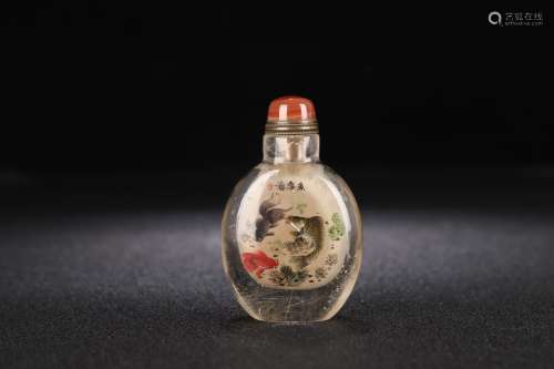 A Crystal Snoof Bottle With Painting
