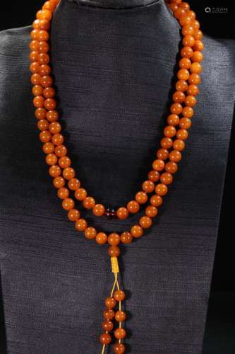 An Amber 108-Bead Rosary Necklace