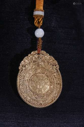 A Gilt Bronze Pendant