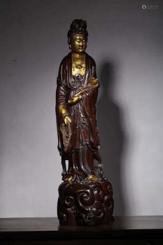 SUANZHI WOOD AND PARCEL GILT 'GUANYIN' STANDING FIGURE