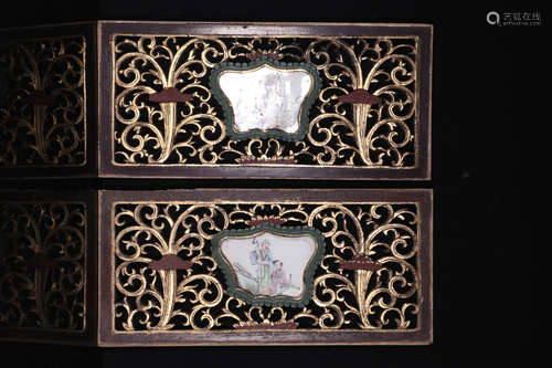 PAIR OF OPENWORK CARVED WOODEN FRAMES EMBEDDED WITH FAMILLE ROSE PORCELAIN PLAQUES