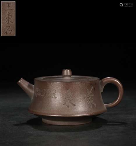 YIXING ZISHA CARVED 'INSCRIPTION' COMPRESSED TEAPOT