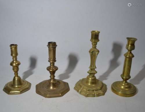 Quatre FLAMBEAUX en bronze, différents modèles H.:…