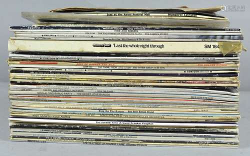 A collection of vinyl to include Michael Bolton and more.