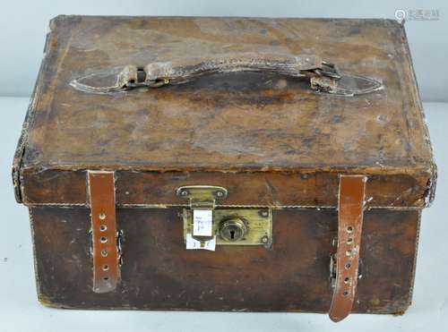 A vintage leather fishing tackle case with brass lock and baize lined interior, unmarked Hardy Bros,