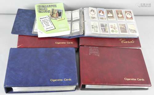 A collection of Five cigarette card albums, including Wills,