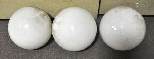 Three large milk glass spherical ceiling lights,