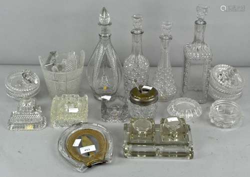 A collection of pressed glass decanters, inkwells and other glass,