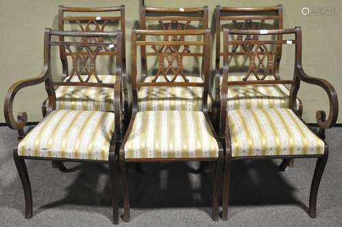 A set of six Regency style mahogany dining chairs with drop in seats. Measures; 89cm high.