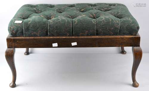 An oak button back upholstered footstool,