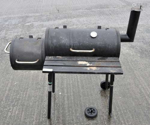 A 'Landmann' barbeque and cover,