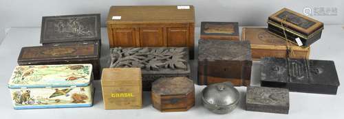 A collection of wooden and tin boxes to include a coffer shaped box,