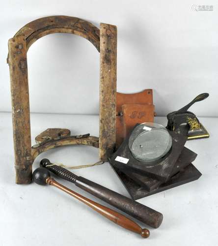 A collection of assorted items including a police truncheon,