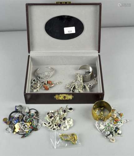 A collection of costume jewellery, to include bangles, chains and necklaces,