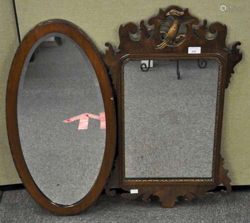 An 18th century mahogany and gilt finish Hoho bird mirror with pierced central motif