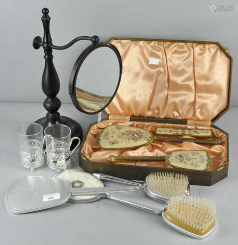 A collection of assorted dressing table items,