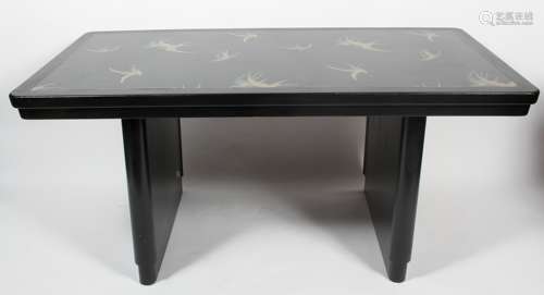 An Art Deco style black painted dining table,