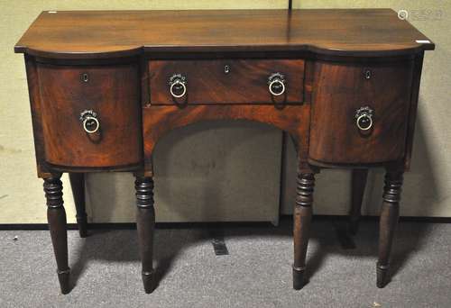 A large late 19th century Mahogany sideboard with two large deep drawers and a single central draw,