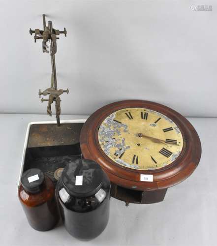 A mahogany cased wall clock and a group of Scientific equipment