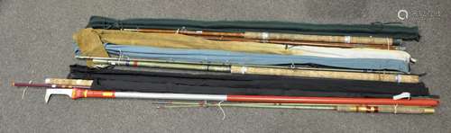 A collection of eight fly fishing rods, to include two Shakespeare,