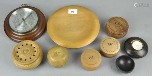 A collection of treenware items to include Royal Commemorative boxes, a treen bowl, pot pourri,