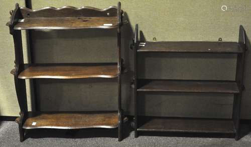 A set of oak wall shelves, of traditional form, with pegged side detail,