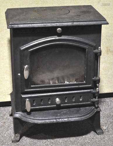 A cast iron log burner. Measures; 58cm x 43cm.