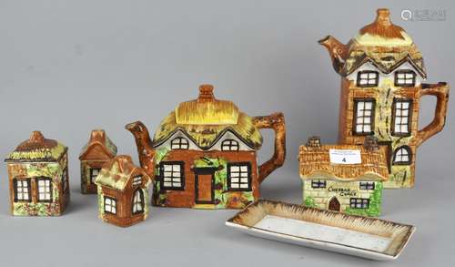 A group of Price and other cottage ware pottery items, to include two jam pots,