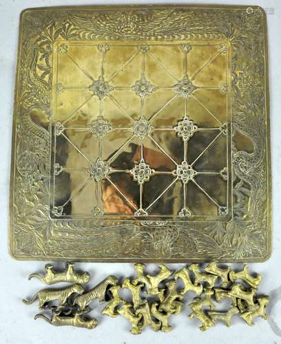 An unusual Bagh-chal Nepalese Brass board game with game piece figures