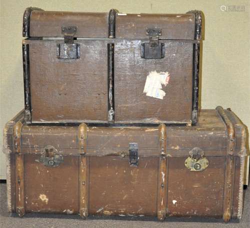 A canvas covered wood bound trunk,