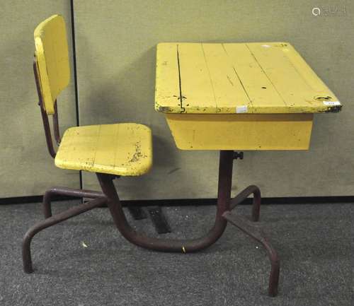 A mid 20th Century painted French children's school desk having a tubular metal construction,