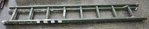 A set of wooden extending ladders,